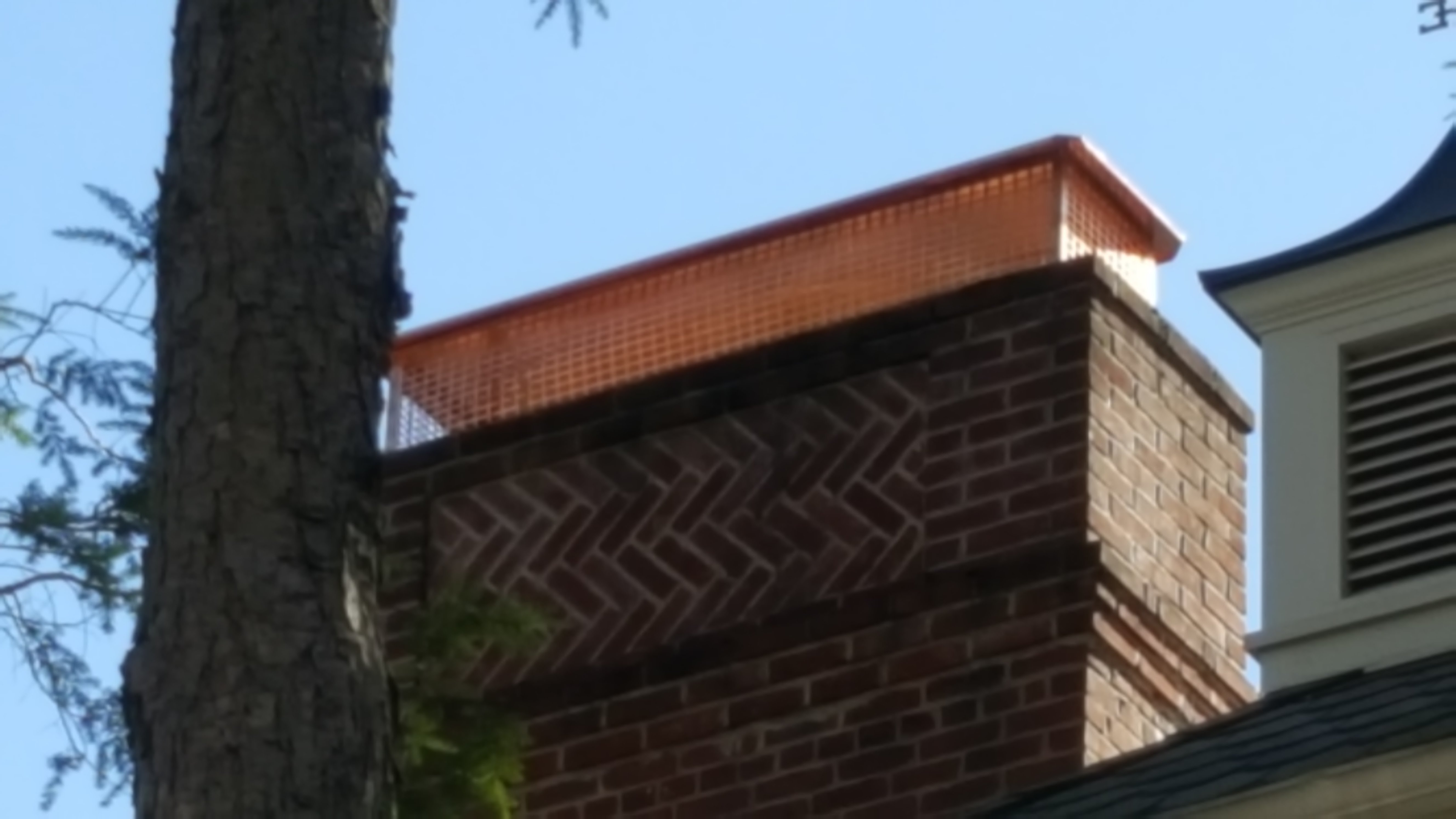 New stainless steel chimney cap installed in Amityville, NY