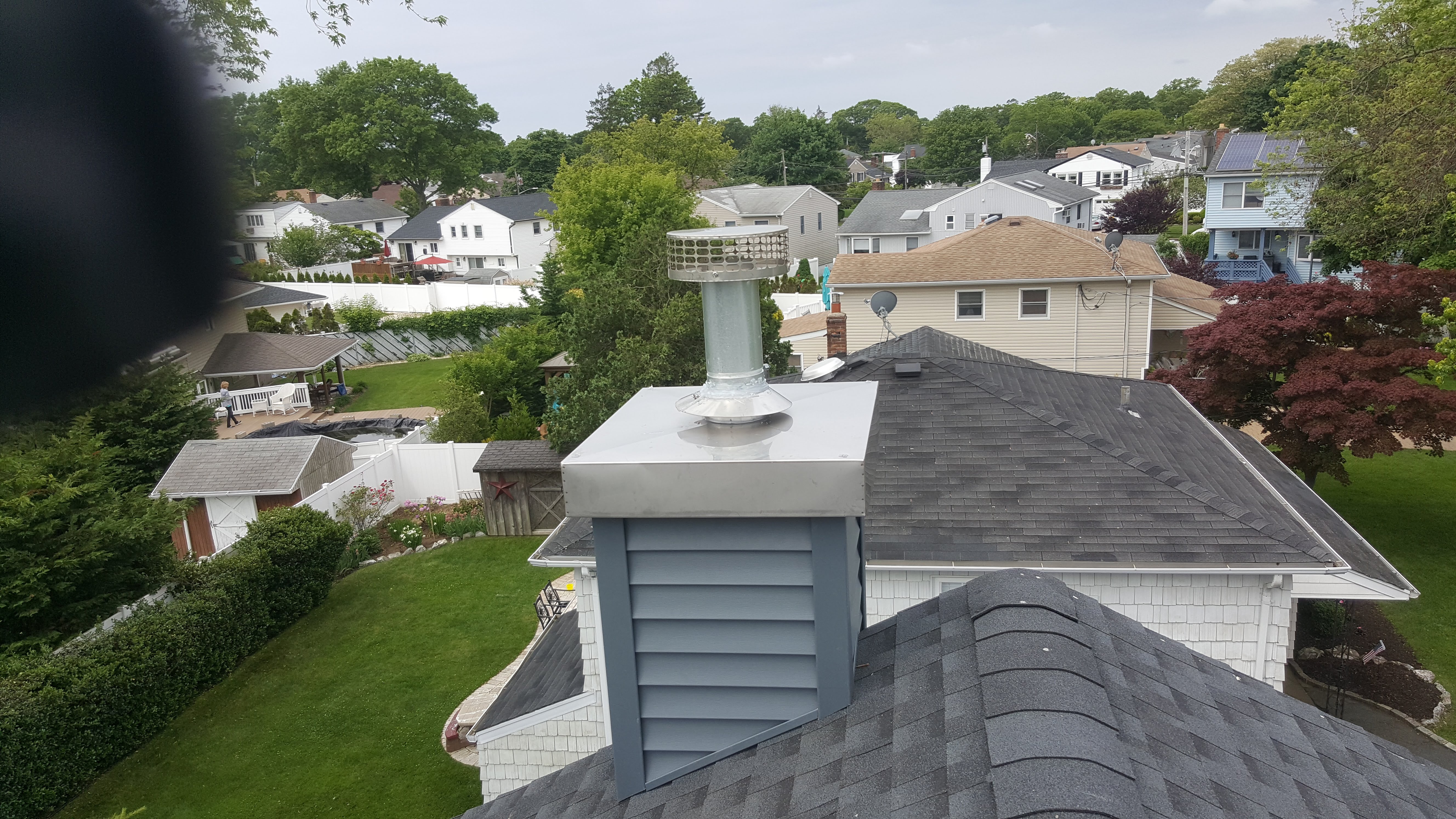 Complete chimney crown rebuild and waterproofing in Amityville, New York